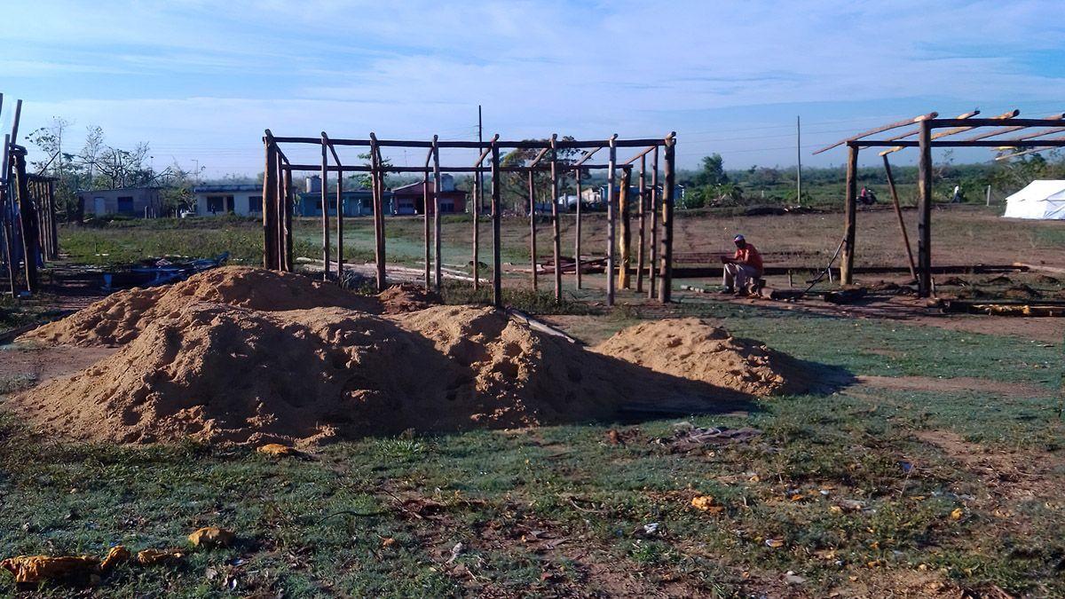 arena construcción casa madera